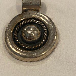 VINTAGE sterling silver pendant.
